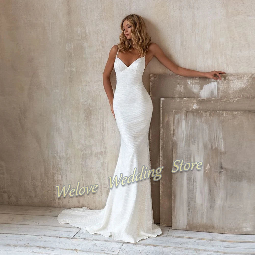 Beach A Line Chiffion Wedding Dresses V-neck Spaghetti Straps Backless Button Boho Bridal Gowns