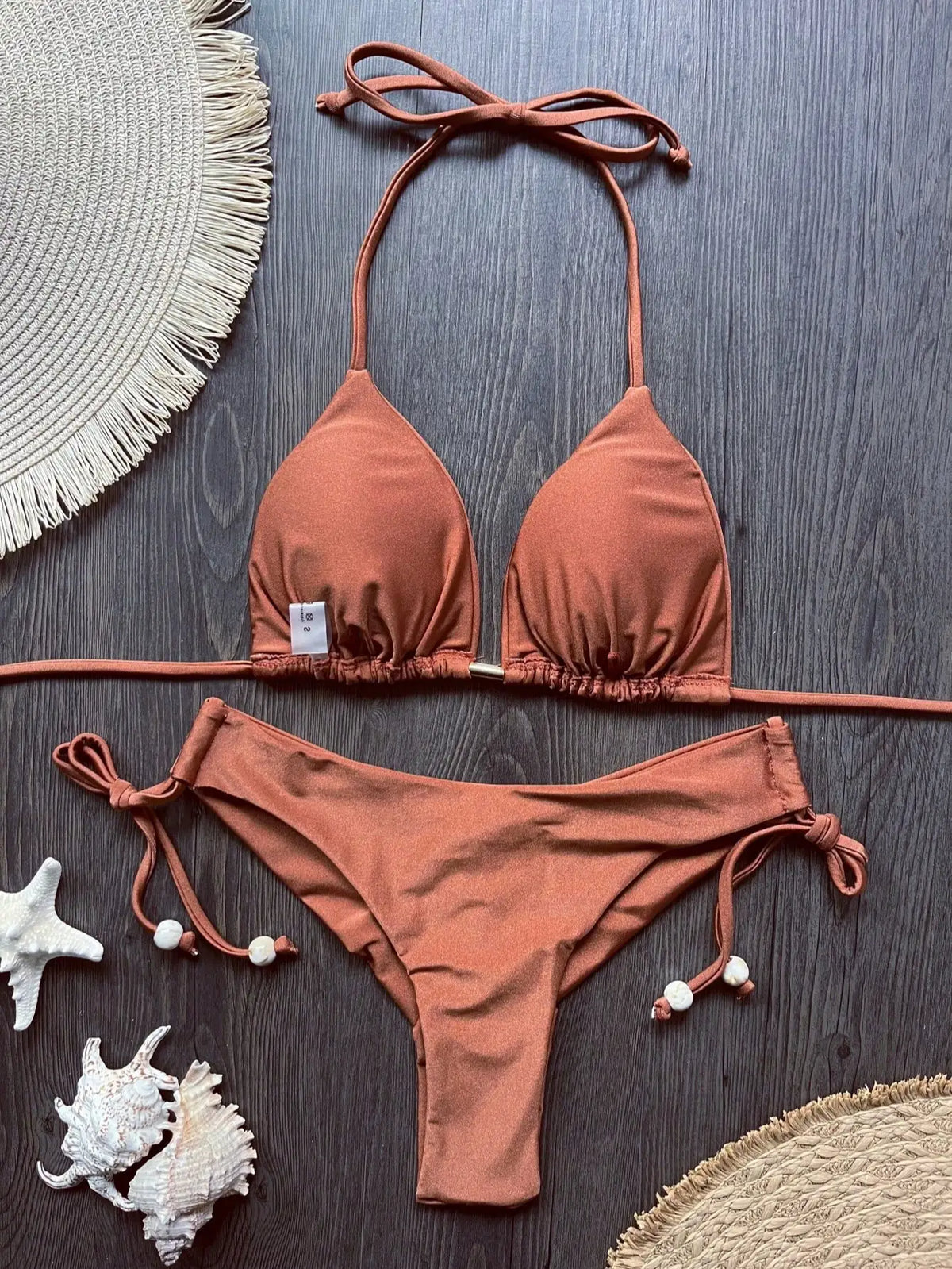 Two-piece micro bikini set for women with triangle swimwear design, from The Clothing Company Sydney, perfect for beach wear.