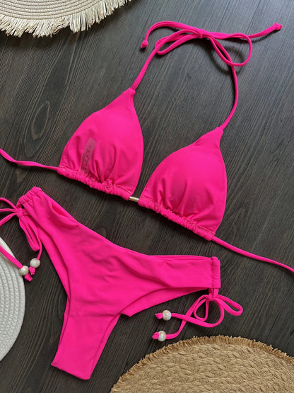 Two-piece foldable micro bikini set by The Clothing Company Sydney, featuring triangle swimwear design for beachwear and swimming.