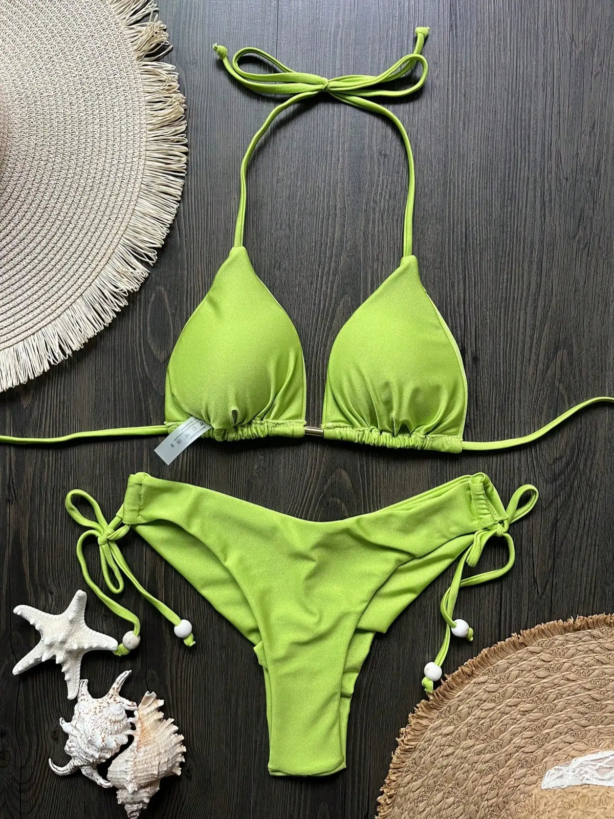 Two-piece micro bikini set for women featuring triangle swimwear by The Clothing Company Sydney, perfect for beachwear and swimming.