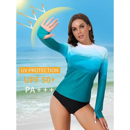 Women's long sleeve printed rashguard swimsuit with thumb holes, crew neck, UV protection, skin-friendly fabric from The Clothing Company Sydney.