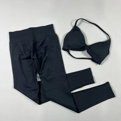 Women's seamless yoga set with halter sports bra and high-waisted lifting leggings in fitness wear style