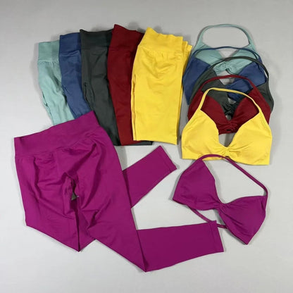 Women's seamless yoga set with halter neck sports bra and high-waisted lifting leggings in fitness wear style