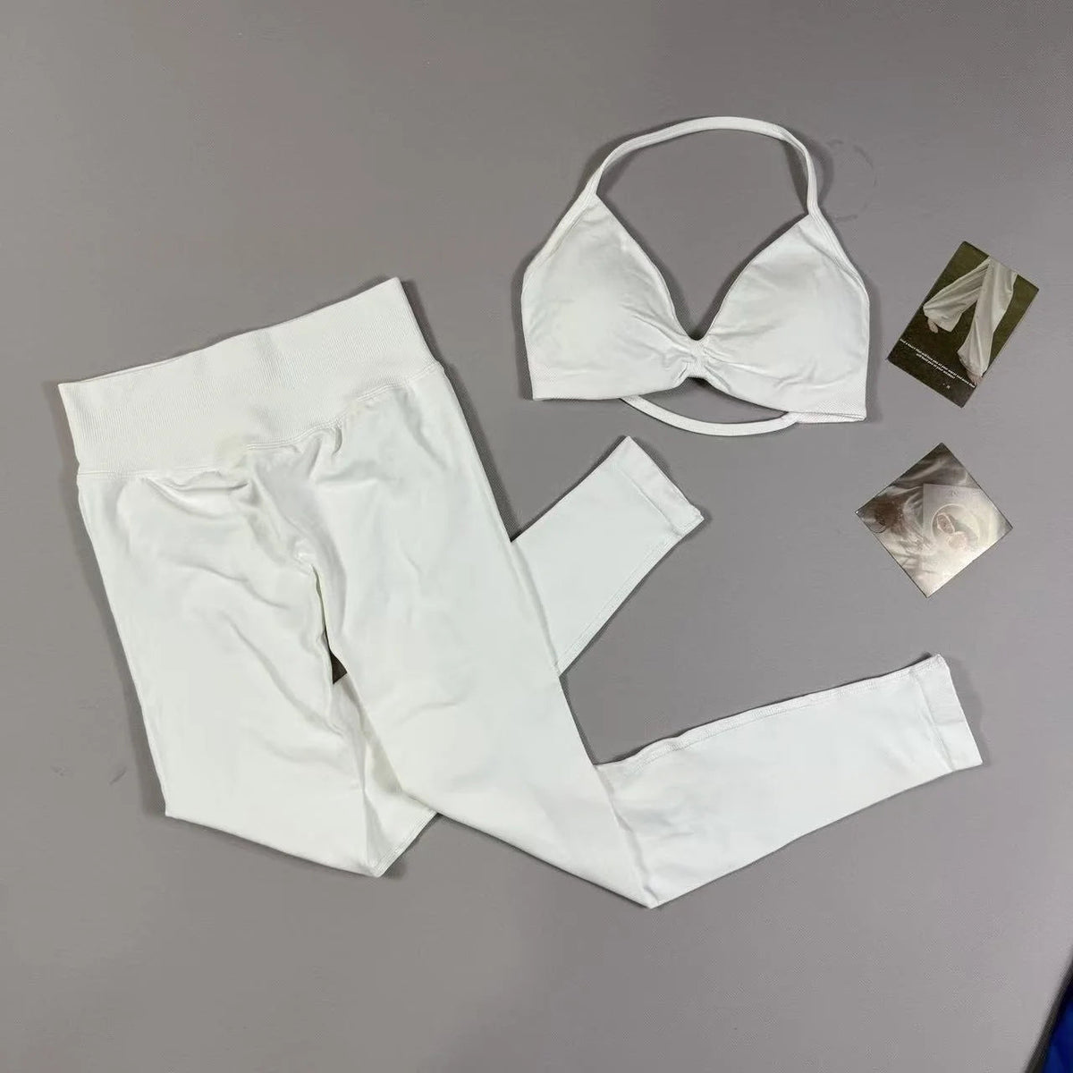 Women's seamless yoga set with halter neck sports bra and high-waisted lifting leggings outfit