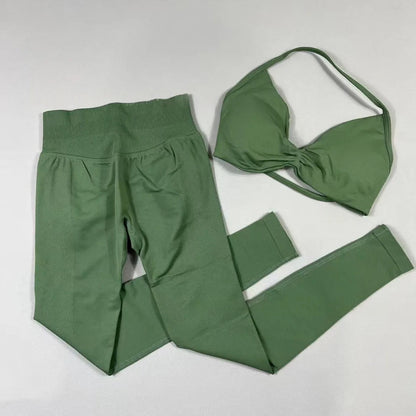 Women's seamless yoga set with halter sports bra and high-waisted lifting leggings for workouts