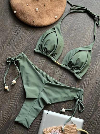 Two-piece women's micro bikini set with triangle tops and matching bottoms, perfect for beachwear and swimming.