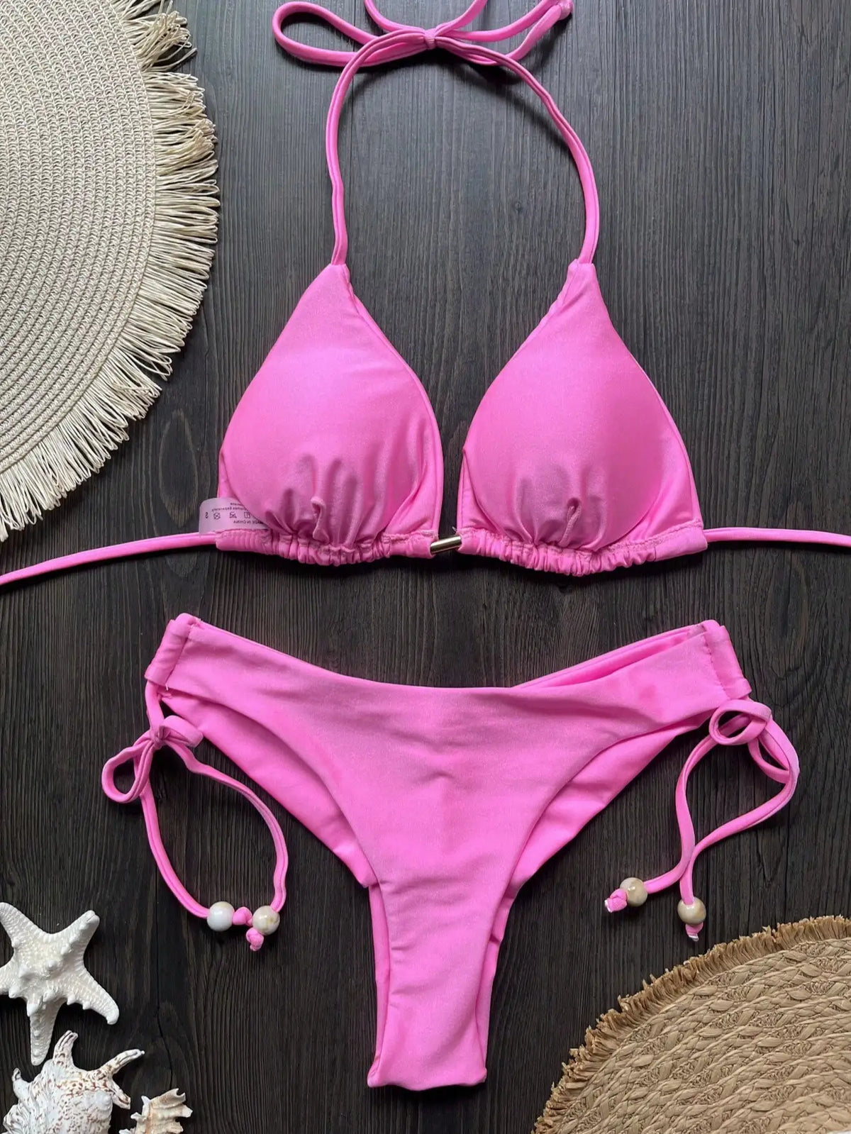 Two-piece micro bikini swimsuit set for women with triangle tops, from The Clothing Company Sydney, perfect for beachwear and swimming.