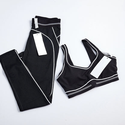 Women's 2-piece striped yoga set with leggings and breathable crop top for gym, running, and workouts