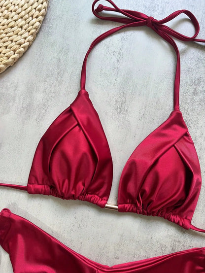 Two-piece micro bikini swimsuit for women featuring triangle tops and matching bottoms, perfect for beachwear and swimming.
