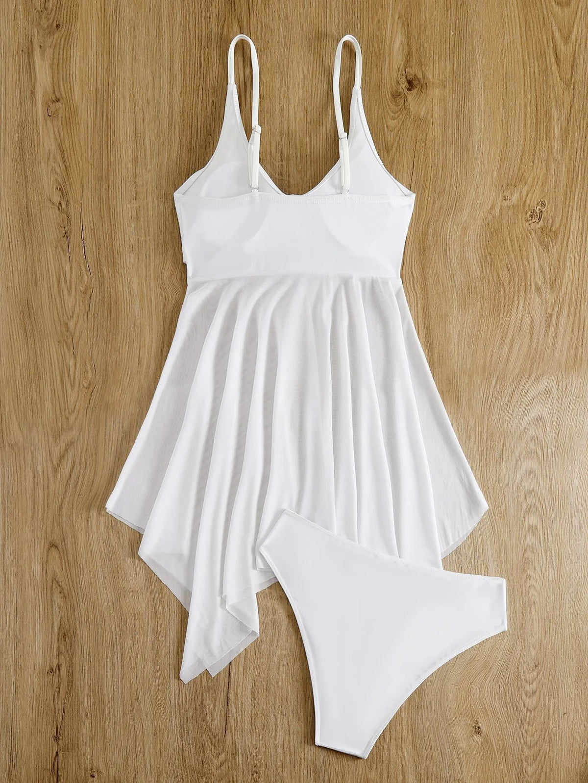 Plus size women's tankini set, two-piece bathing suit with swim dress design in patterned fabric