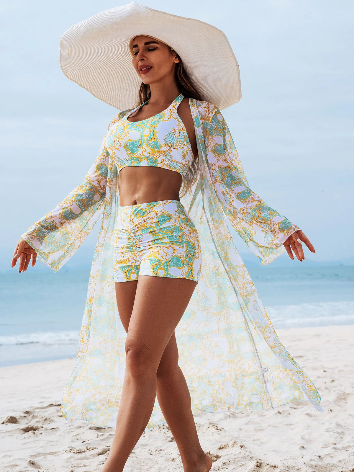 Women's three-piece summer tankini swimsuit set with push-up top and matching bottoms, blue floral print