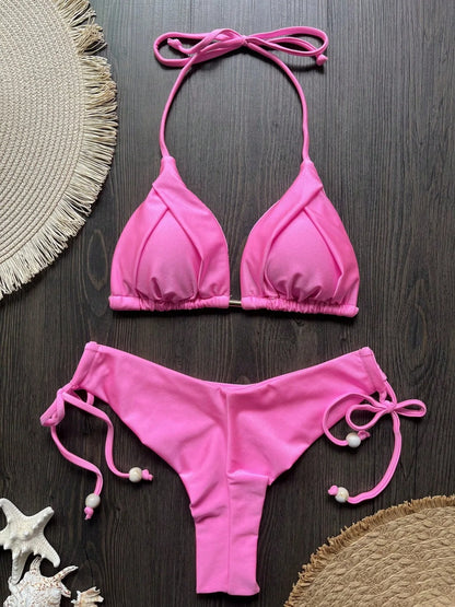 Two-piece micro bikini swimsuit for women featuring triangle tops, from The Clothing Company Sydney, ideal for beachwear and swimming.
