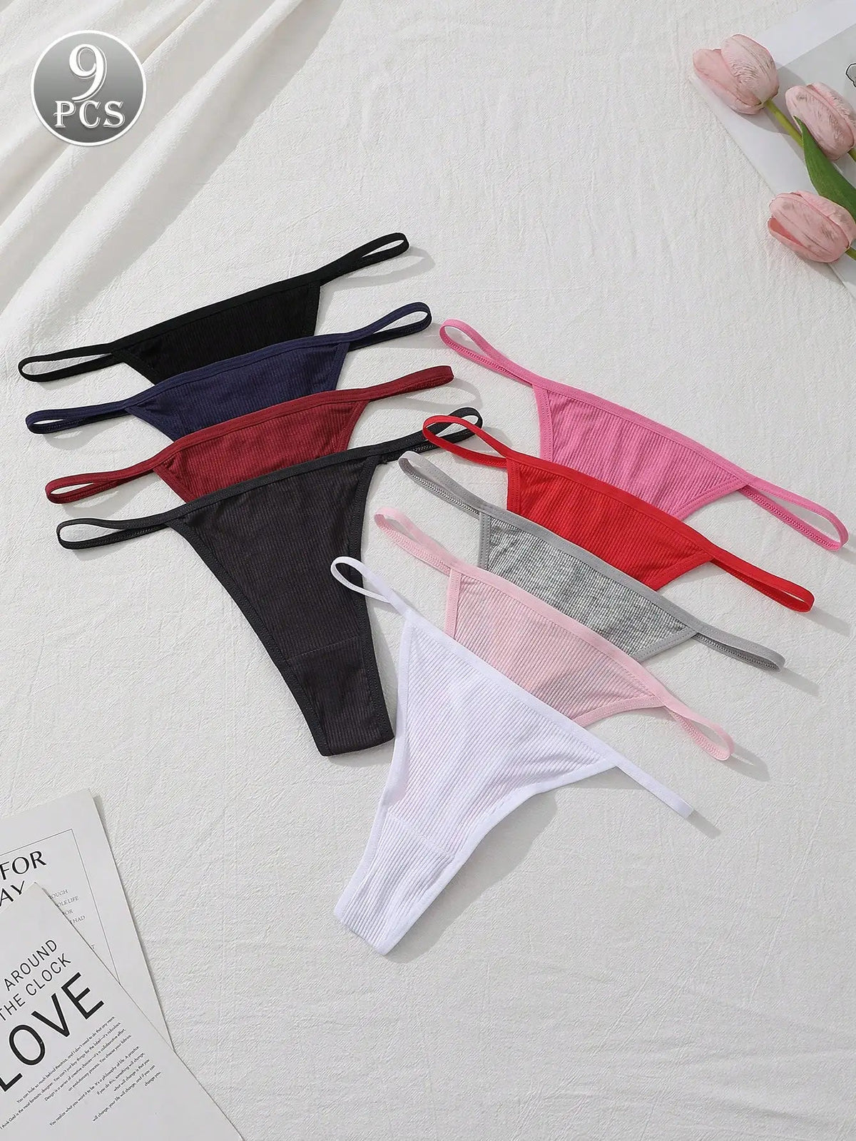 9-pack ribbed low-waist seamless thong panties in assorted colors, soft breathable lingerie underwear flat lay
