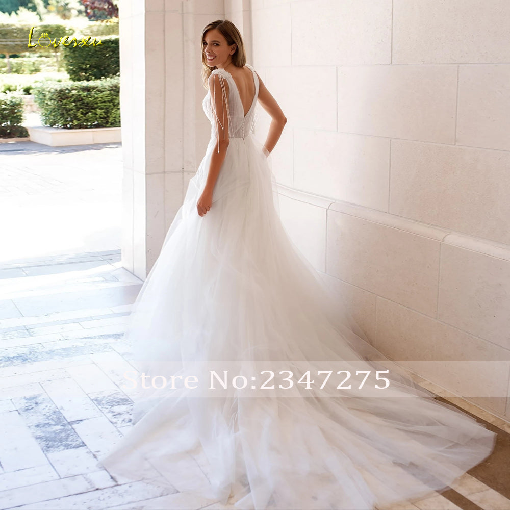 V-Neck Sleeveless Tassel Robe Beaded Appliques A-Line Wedding Dress The Clothing Company Sydney